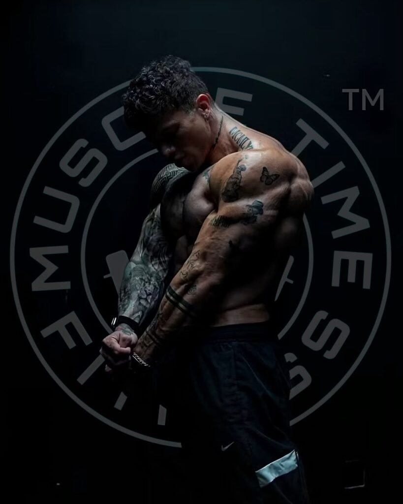 Muscle Time Fitness member arm pose