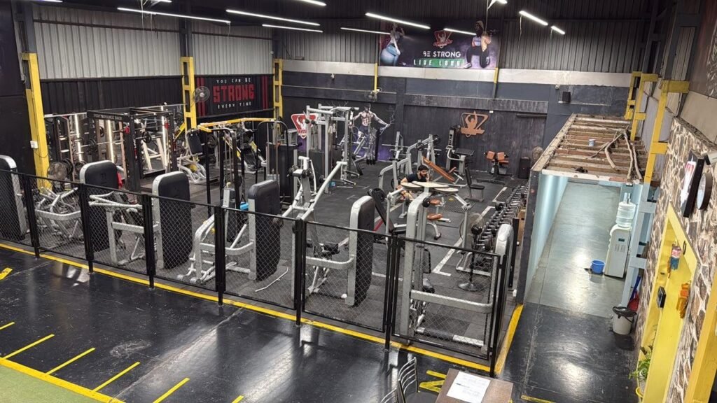 Strength and machine floor at Muscle Time Fitness gym, Pune